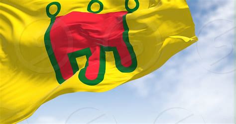 View of the Auvergne flag waving in the wind on a clear day. Auvergne is a former administrative ...