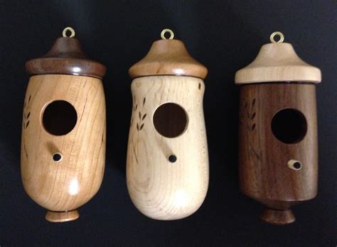 Hummingbird houses. Available in cherry, maple and walnut.