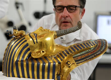 King Tut mask, broken beard restored, goes back on display - CBS News