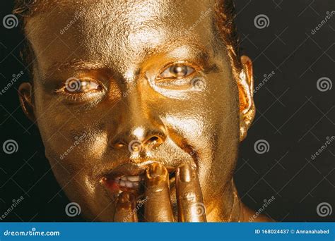 Portrait of Beautiful Woman Painted in Gold Stock Image - Image of body, gold: 168024437