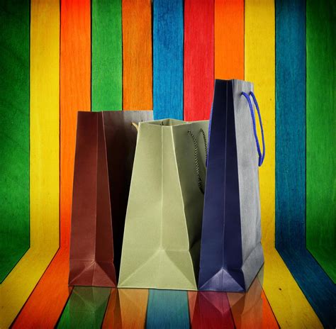 shopping bags on colorful wood Background 14164851 Stock Photo at Vecteezy