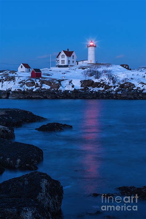 Nubble Lighthouse in Winter Photograph by Sharon Seaward