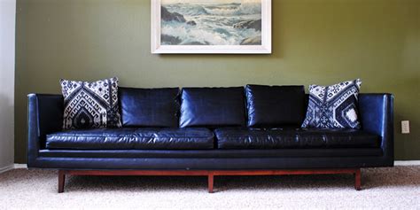 Found: Mid Century Modern Black “Leather” Sofa - The Gathered Home
