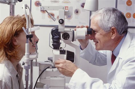 Optometrist with patient