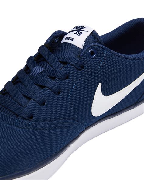 Nike Womens Sb Check Solarsoft Canvas Shoe - Midnight Navy White ...