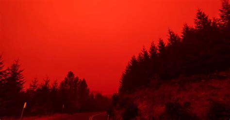 Wildfire photos and videos show "apocalyptic" red and orange skies across Western U.S. - CBS News