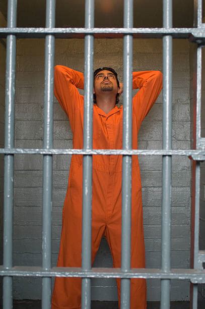 Royalty Free Prison Uniform Pictures, Images and Stock Photos - iStock