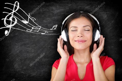 Music - woman wearing headphones listening to music — Stock Photo © Maridav #31779211