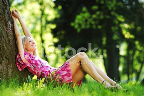 Girl Lying Under A Tree Stock Photo | Royalty-Free | FreeImages