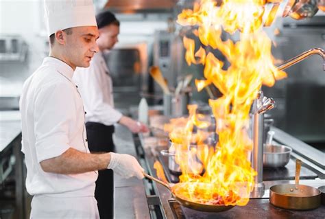 Premium Photo | Cook cooks in a restaurant.