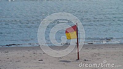 Red and Yellow Flag on the Beach. the Flag Designating the Territory Protected by Rescuers ...