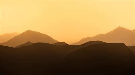 The silhouette of a mountain range at sunset photo – Free Austria Image on Unsplash