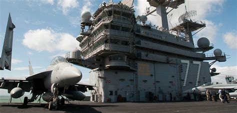 On board USS George HW Bush as she helps the RN back into the aircraft ...