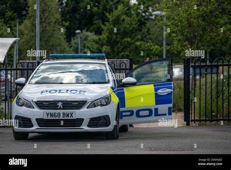 Police Car with Door Open Stock Photo - Alamy