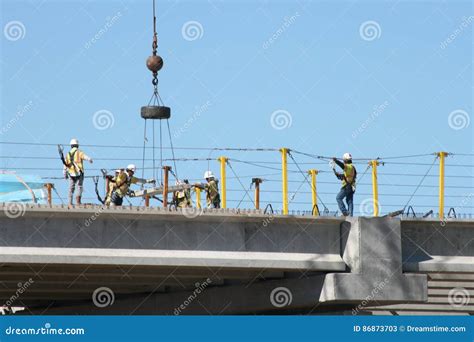 Teamwork: at Interstate 69 Construction Site, Laborers Work Together ...