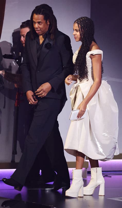 Blue Ivy, 12, looks elegant at Grammys 2024 in white dress and platform ...