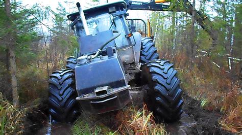 Watch Valtra's Powerful Forestry Tractor Tackle Logging in the Wettest Conditions