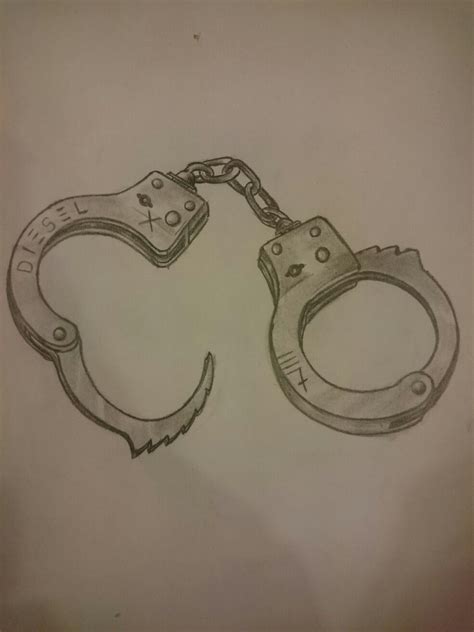 Broken handcuffs tattoo | TATTOO