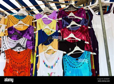 Clothes on a market Stock Photo - Alamy