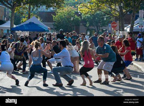 Group of people dancing at a street party Stock Photo - Alamy