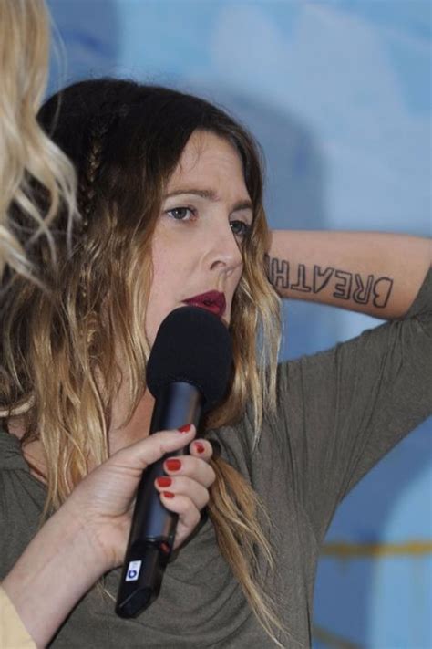 Drew Barrymore’s 9 Tattoos & Their meanings - Body Art Guru