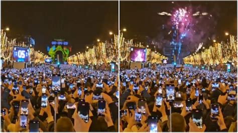 Viral video shows sea of phone screens as New Year fireworks light up ...