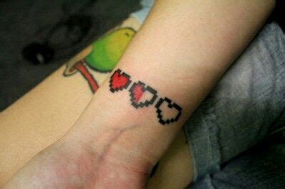 8-bit heart tattoo | Neck tattoo, Zelda tattoo, Tattoos