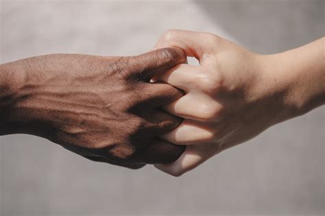 Picture of Two Hands Interlocking Fingers — Free Stock Photo