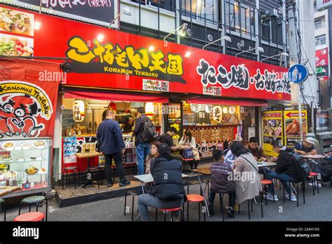 Osaka, Japan - Restaurant selling street food in Dotonbori Stock Photo ...