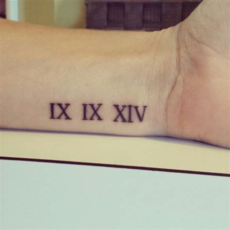 14 Roman Numeral Tattoo