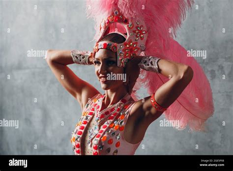 Woman in samba or lambada costume with pink feathers plumage Stock ...