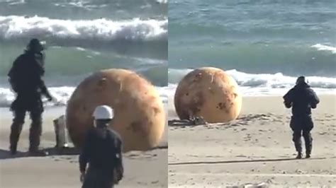 Godzilla egg? Large, mysterious metal sphere beached in Japan fuels ...