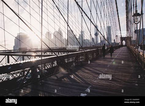 Brooklyn bridge at sunset, New York City Stock Photo - Alamy