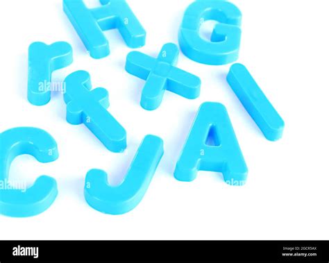 Colorful magnetic letters isolated on white Stock Photo - Alamy