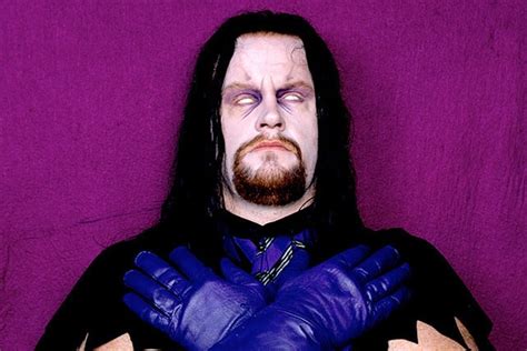 When did the Undertaker stop using the purple attire? : r/WWE