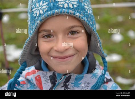Little boy with a mountain hat Stock Photo - Alamy