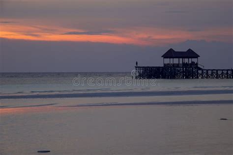 Silhouette of Asian Guy Fishing from a Pier at Sunset Stock Photo - Image of beauty, freedom ...