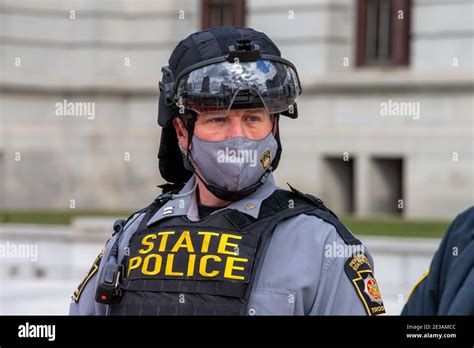 A Pennsylvania State Police trooper guarda the Pennsylvania State ...