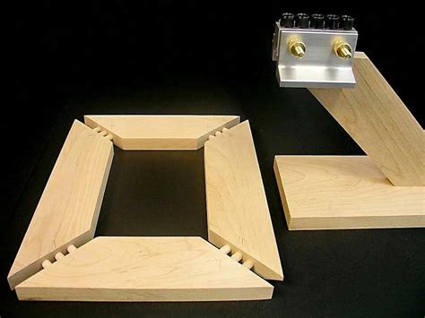 This picture shows a 1x4 to 1x4 multiple dowel woodworking miter joint configuration for ...