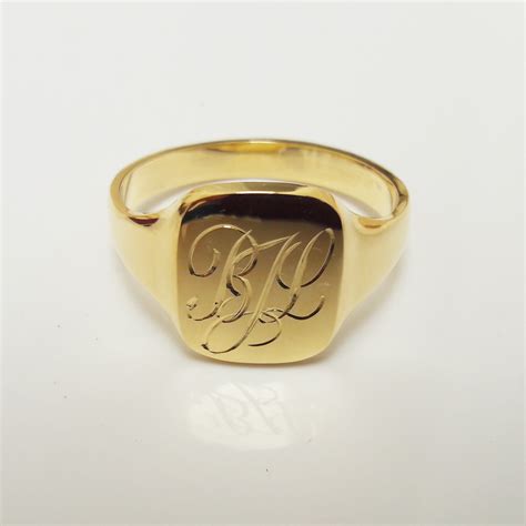 Hand engraved solid gold signet ring