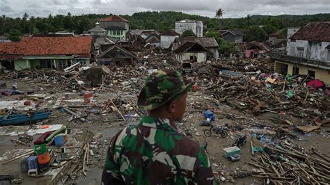 Tsunami aftermath: One man found his family safe, while another lost ...