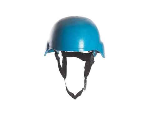 Premium Photo | Blue un helmet on a white background