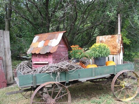 Old Farm Wagon...loaded down with fall treasures...grapevine, mums ...