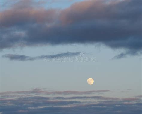 Yellow Moon On The Evening Sky Stock Photo - Image of pretense, darker: 106477856