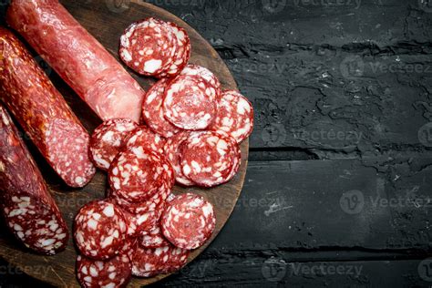 Different types of salami on the Board. 32010511 Stock Photo at Vecteezy