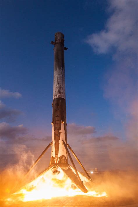 Stunning new SpaceX photos show a twice-used rocket landing on a ship - Business Insider