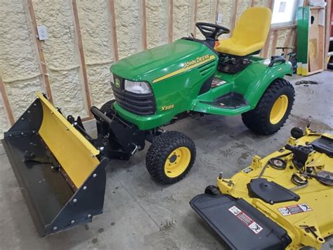 John Deere X585 4x4 Garden Tractor & Attachments - ReGreen Equipment