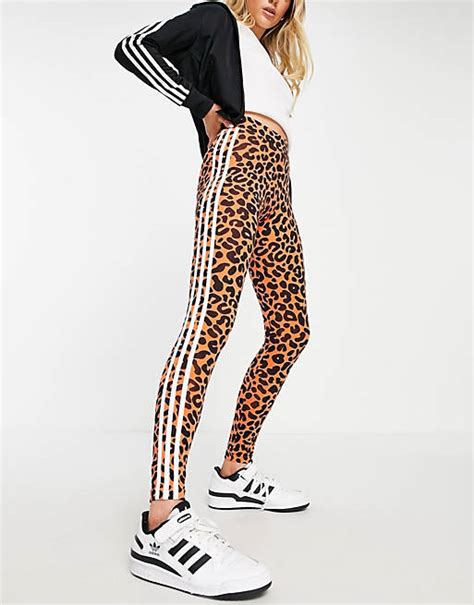 adidas Originals x Rich Mnisi all over leopard print leggings in orange | ASOS