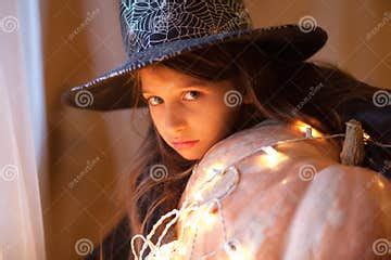 Little Girl in Witch Costume is Ready for Trick or Treat Stock Image ...