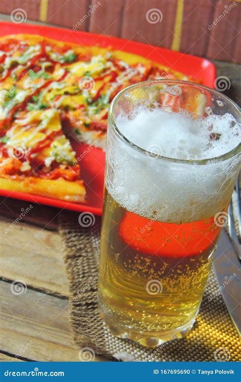 Pizza and beer stock photo. Image of delicious, meat - 167695690